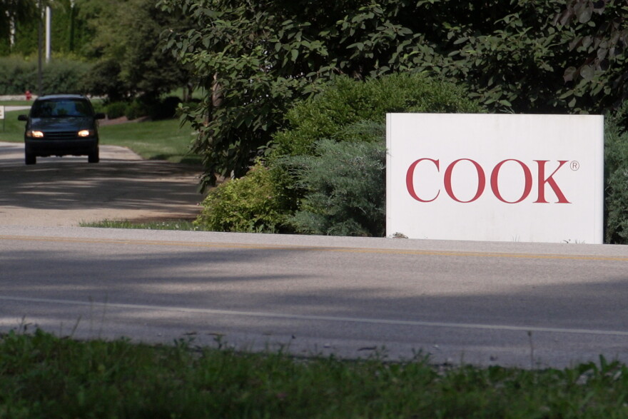 A sign at the entrance to Cook Group Inc. in Ellettsville.