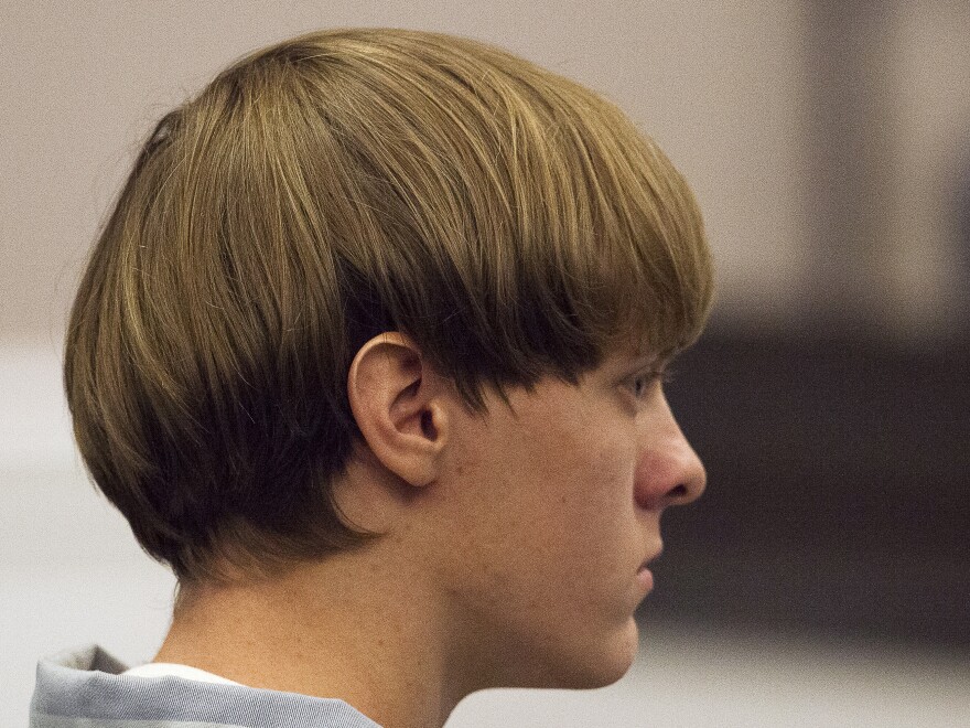 Dylann Roof, 21, charged with murdering nine worshippers at a historic black church in Charleston, S.C., in June, listens during court proceedings earlier this month.