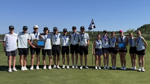 The Rock Ridge boys and girls golf teams pose for a photo together after both teams qualified for the 2026 Minnesota State High School League state golf tournaments.