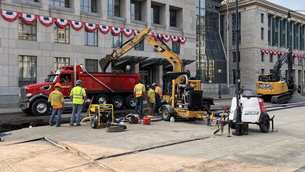 Crews work at the scene of a water main break on North Washington Avenue in downtown Scranton on Monday evening, July 27, 2026.