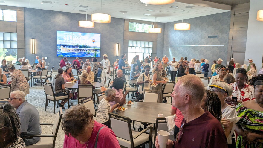Visitors to the grand opening were checking out the center's large dining hall.