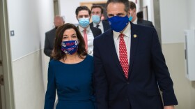 Gov. Andrew Cuomo, right, with Lt. Gov. Kathy Hochul hold a COVID-19 press briefing update at Roswell Park in Buffalo on Jan. 25, 2021.