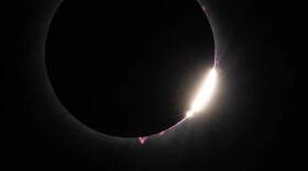 During a solar eclipse, Baily’s Beads and solar prominences are seen just after totality in Dallas on Monday, April 8, 2024.