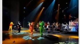 An image from a video posted by StimmeKoreas, which in turn came from North Korea official media, showing some of the dancing (fake) Disney characters at Friday's performance.