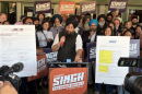 Naindeep Singh, center, speaks during a press conference outside the Tower Theater in Fresno, Calif., on Monday, Oct. 26, 2026, where he countered claims by Fresno police that he drove under the influence of a drug days earlier.