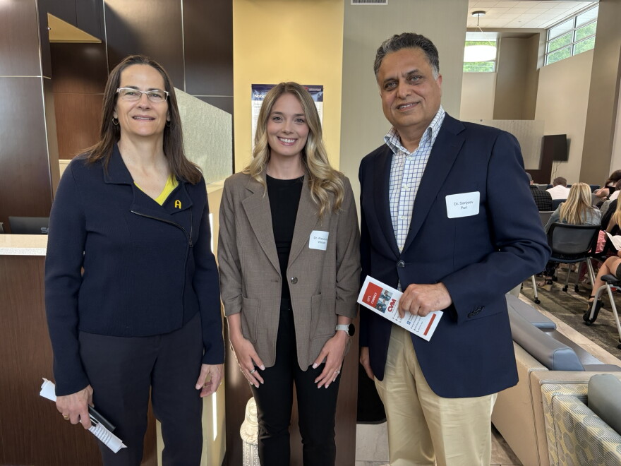 (left to right) Augustana President Andrea Talentino, Dr. Alexandra Wilson, and Dr. Sanjeev Puri at the scholarship ceremony held on Wednesday, May 21st, at CVM in Moline.