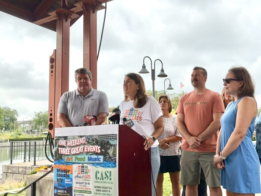 Rachel DeDomenico, president of the Downtown North Tonawanda Merchants Association, speaks at a press conference in North Tonawanda on August 12, 2026.