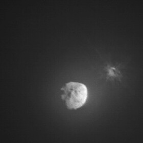 In this image made available by NASA, debris ejects from the asteroid Dimorphos, right, a few minutes after the intentional collision of NASA’s Double Asteroid Redirection Test (DART) mission on Sept. 26, 2022, captured by the nearby Italian Space Agency’s LICIACube. On Tuesday, Oct. 5, 2022l, NASA said the spacecraft succeeded in shifting its orbit.
