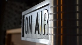 A close-up of an "on air" sign.