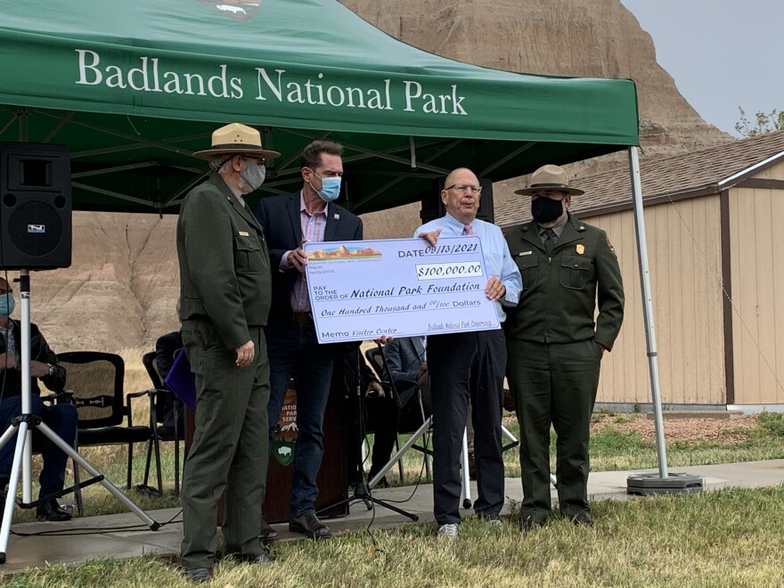 Badlands National Park and nonprofit leaders celebrate a donation for the park's new visitor center