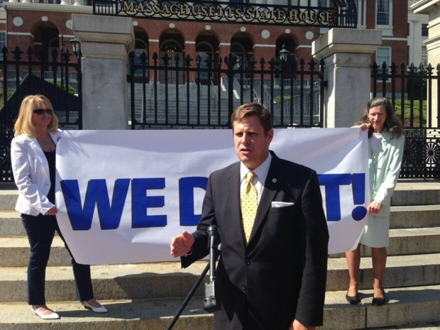 State Rep. Geoff Diehl speaking outside the State House in Boston.