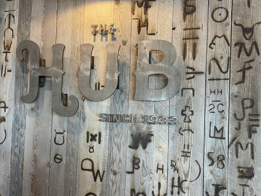 The Hub features local farmers' brands on its entrance wall.