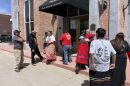 Friends and family of Ella Mae Begay gather outside of a Flagstaff courtroom on Fri, April 7, 2023 following the arraignment of Preston Henry Tolth. He pleaded not guilty to assault and carjacking in connection to the 2021 disappearance of Begay. His federal trial is set for May in Phoenix.