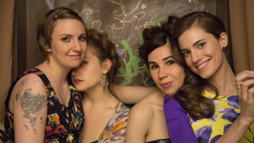 Lena Dunham (left) plays Hannah on the HBO series <em>Girls. </em>She also writes about the other women in their 20s, including Jessa (Jemima Kirke), Shoshanna (Zosia Mamet) and Marnie (Allison Williams).