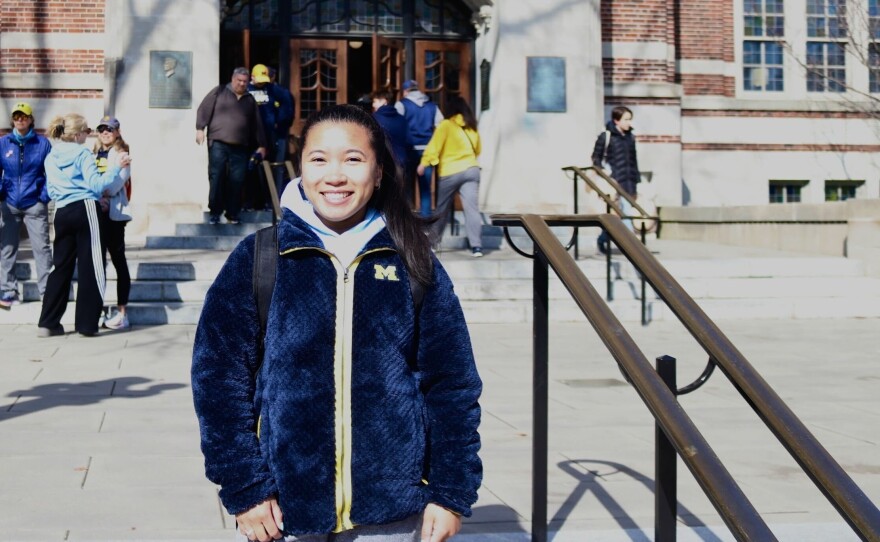 University of Michigan alum Chiara Baste stands outside the Michigan Union for the parade.