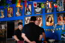 Photos of Venezuelan Miss Universe contestants line a wall at Arempa's restaurant Tuesday, July 14, 2026, in Midvale, Utah.