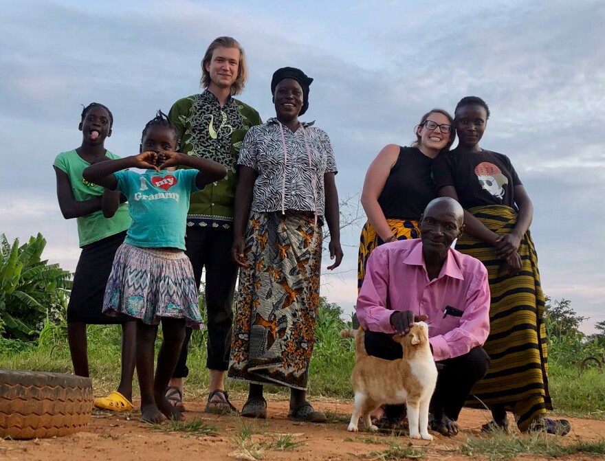 Adam Burgess, third from the left, with his host family in 2020.