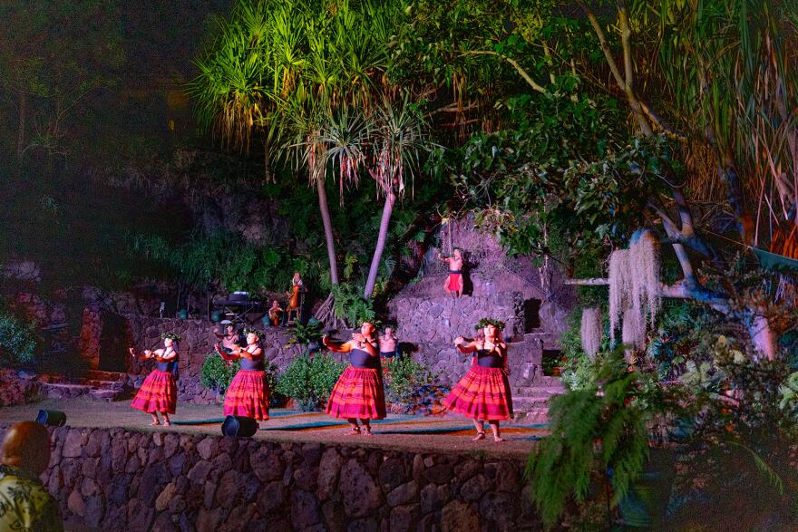 Hula dancers perform at the Queenʻs Aloha Lūʻau.