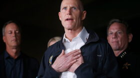In this Feb. 14, 2018, file photo, Florida Gov. Rick Scott speaks during a news conference in Parkland, Fla. (AP Photo/Wilfredo Lee, File)
