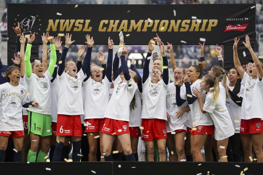 Washington Spirit players celebrate after defeating Chicago Red Stars in the NWSL Championship soccer match Nov. 20, 2021, in Louisville, Kentucky.