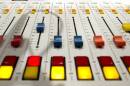 A 2014 file photo shows an audio mixing board at the KCUR studios.