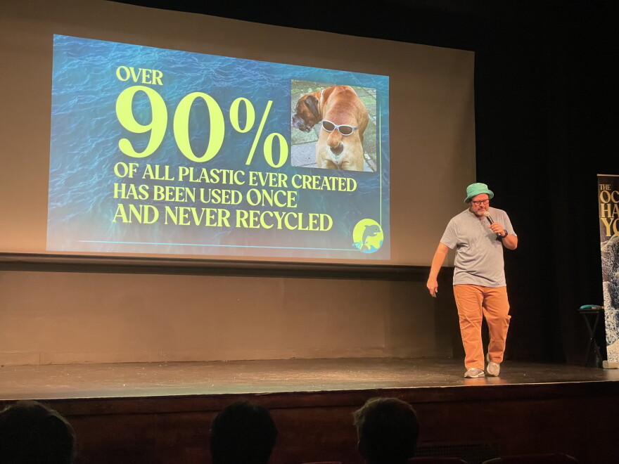 Climate comedian Forrest Shaw on stage at the Waldo Theater.