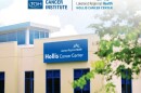 Exterior of a building with a blue sigh: Hollis Cancer Center