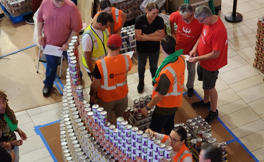 Eleven teams of Arizona architects, engineers and construction workers recreated Olympic scenes in sculptures made entirely from cans of food for the 17th annual Canstruction Phoenix Metro Design Build in August 2024.