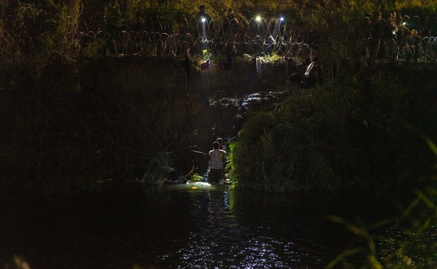 Migrants attempting to cross the Rio Grande between Matamoros and Brownsville on May 11, 2023.