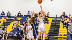 Basketball player shooting 