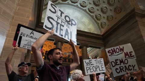 Josiah Zimmer, 29, of St. Louis’ Tower Grove East neighborhood, joins thousands in protesting the Missouri legislature’s efforts to redraw congressional maps in favor of Republicans and change the initiative petition process on Wednesday, Sept. 10, 2025, at the state Capitol in Jefferson City.