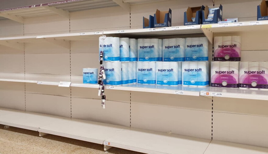 A view of almost empty shelves in a supermarket. (Gareth Fuller/PA Images via Getty Images)
