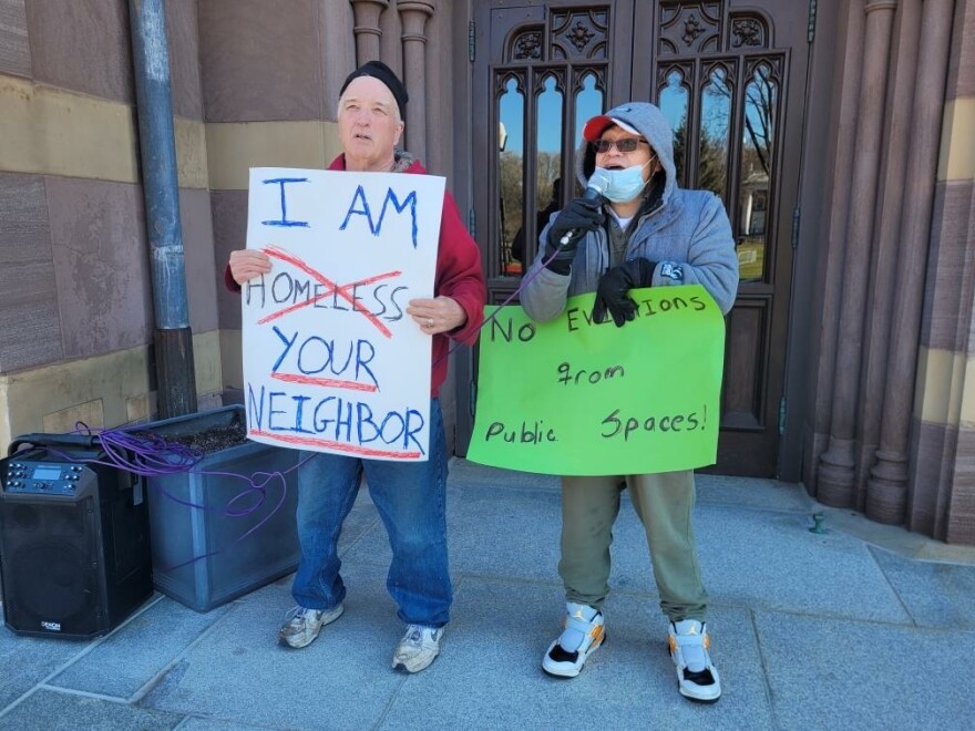 Mark Colville of the Amistad Catholic Worker house calls for access to free public restrooms, showers and other basic amenities for New Haven's unhoused residents and allies.