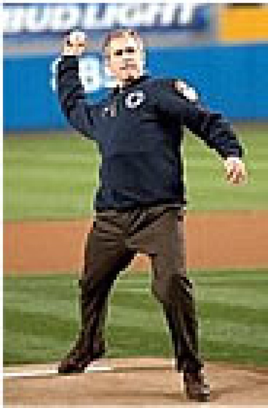 White House photo of President Bush throwing out first pitch at Game Three of the 2001 World Series (Oct. 30, 2001)