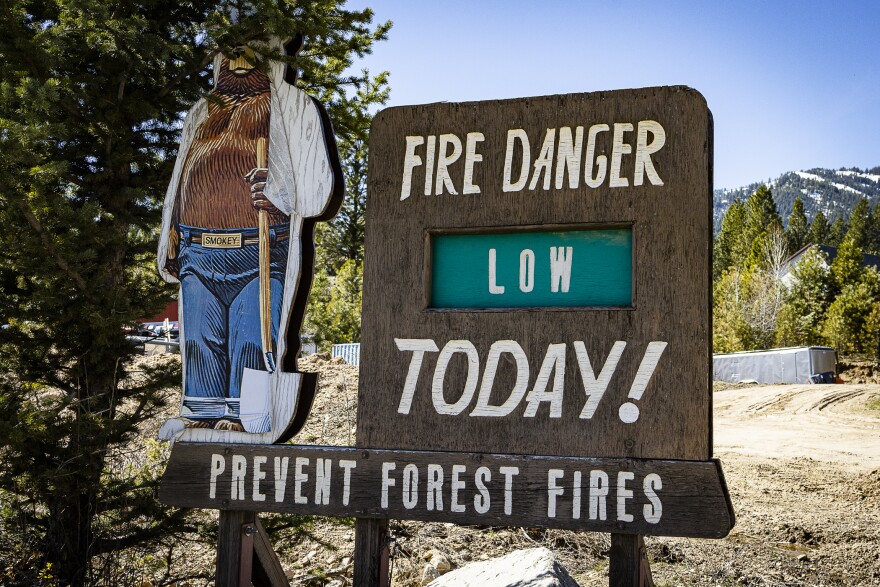 A U.S. Forest Service signs says the fire danger was low in Crouch in late March, but the area saw a number of significant wildfires in 2024.