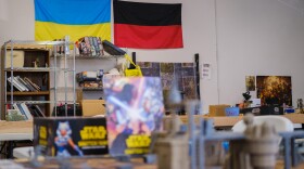 The Emerald Game House has the Ukrainian flag on the walls in show of solidarity and support while patrons can enjoy games about fantasy wars as well, October 5, 2023. (Brian Venua/KMXT)