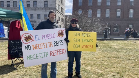 Bill Best (left) and Lorraine Costa (right) came to Concord from Wilmot to attend a No Kings rally in Concord.