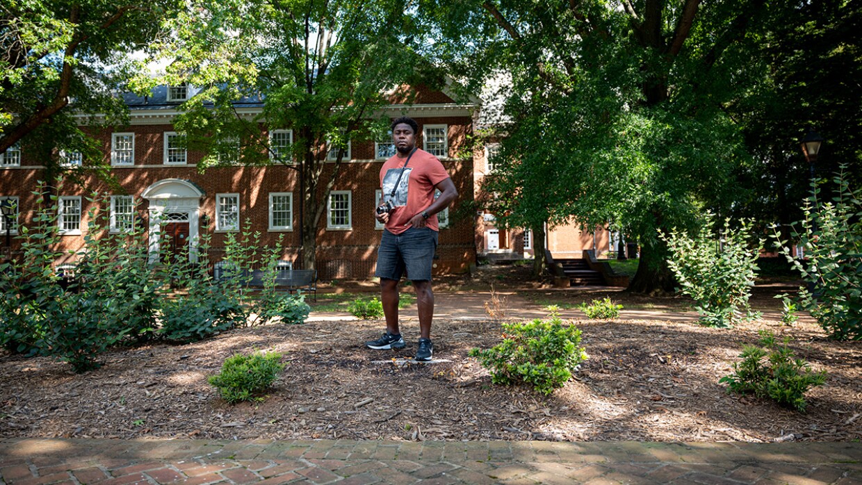 Documentary photographer, Eze Amos, stands at the site where the equestrian statue of Stonewall Jackson once stood near the Albemarle Country Circuit Courthouse. photo by Christopher Tyree // VCIJ at WHRO