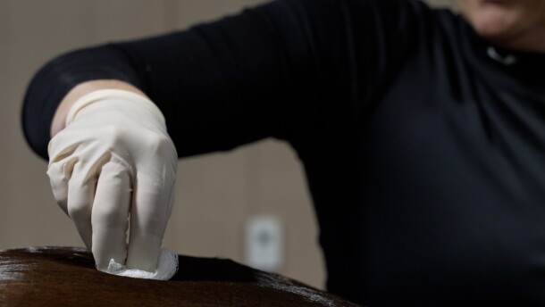 A veterinarian performing work on a horse.