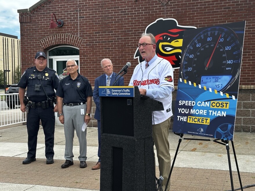 DMV Commissioner Mark Schroeder speaks at Innovative Field on Wednesday.