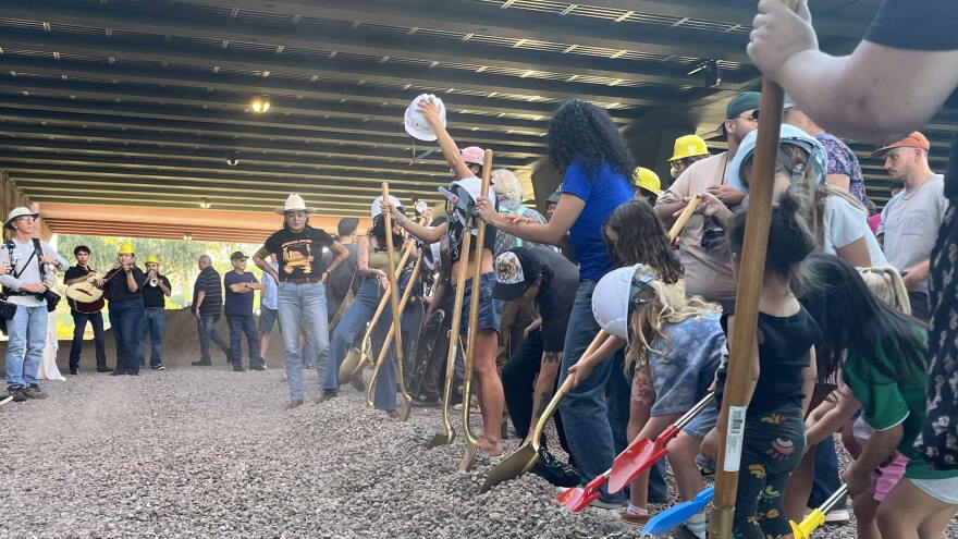 Community members dig
