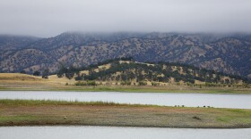Lake Berryessa is seen with mountains in the background.