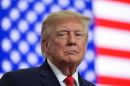 President Donald Trump listens at a campaign rally at the Curtis D. Menard Memorial Sports Center, Tuesday, Oct. 13, 2026, in Wasilla, Alaska. (AP Photo/Alex Brandon)