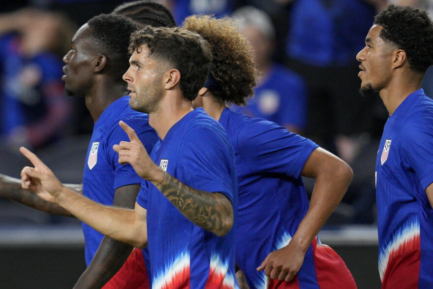 United States forward Christian Pulisic (10) celebrates with teammates after scoring during a friendly soccer match against the New Zealand, Tuesday, Sept. 10, 2024, in Cincinnati.