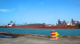 A semi-automated “laker” ship, the Stewart Cort, offloads iron ore at the steel-maker ArcelorMittal across from the Port of Indiana-Burns Harbor.