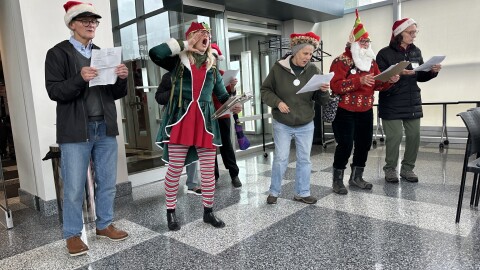 Environmental activists from the group Save Ohio Parks came in holiday costumes to the Oil and Gas Land Management Commission meeting, singing revised Christmas carols with lyrics related to fracking.