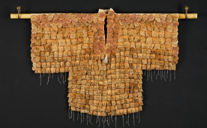 <em>Tea Ceremony</em>, a kimono made of used tea bags by Wewer Keohane. Much like a complex Japanese tea ceremony itself, Keohane says making her kimonos "is as much about the process as it is about the outcome."