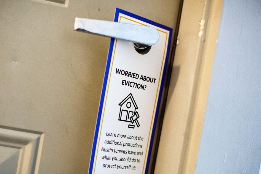 The door hangers tell tenants in English and Spanish where they can read about current eviction protections during the pandemic. 