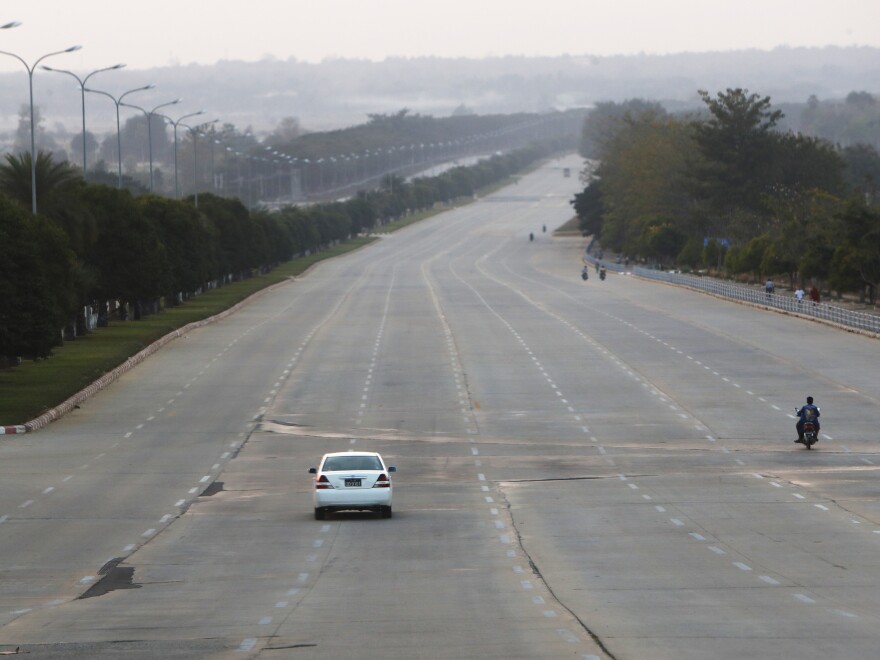 Vehicles make their way on a road in Naypyitaw, Myanmar, Feb. 1.