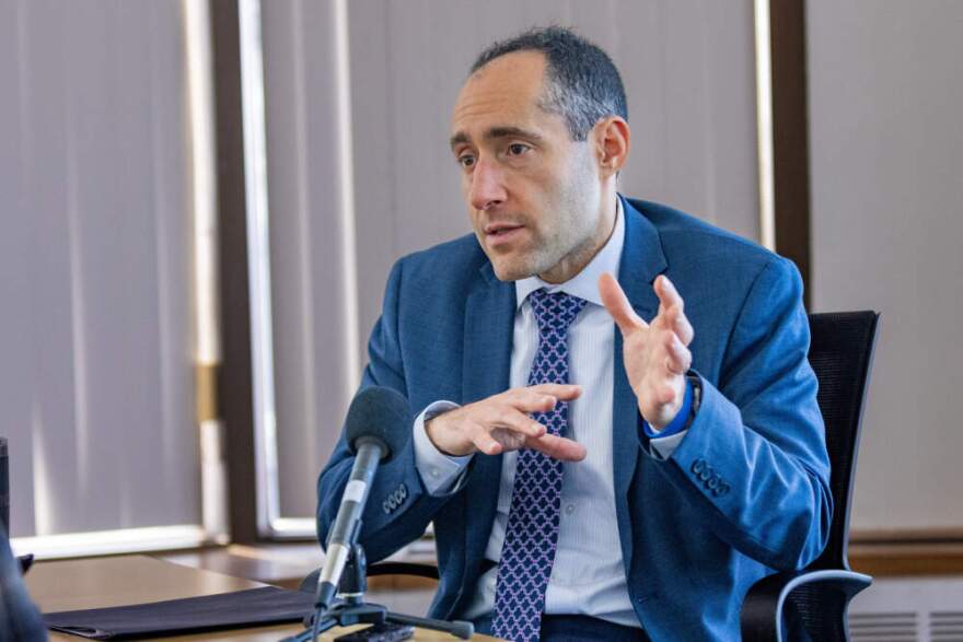 Massachusetts Secretary of the Executive Office of Economic Development Eric Paley speaking during an interview with WBUR’s Chris Van Buskirk. (Jesse Costa/WBUR)